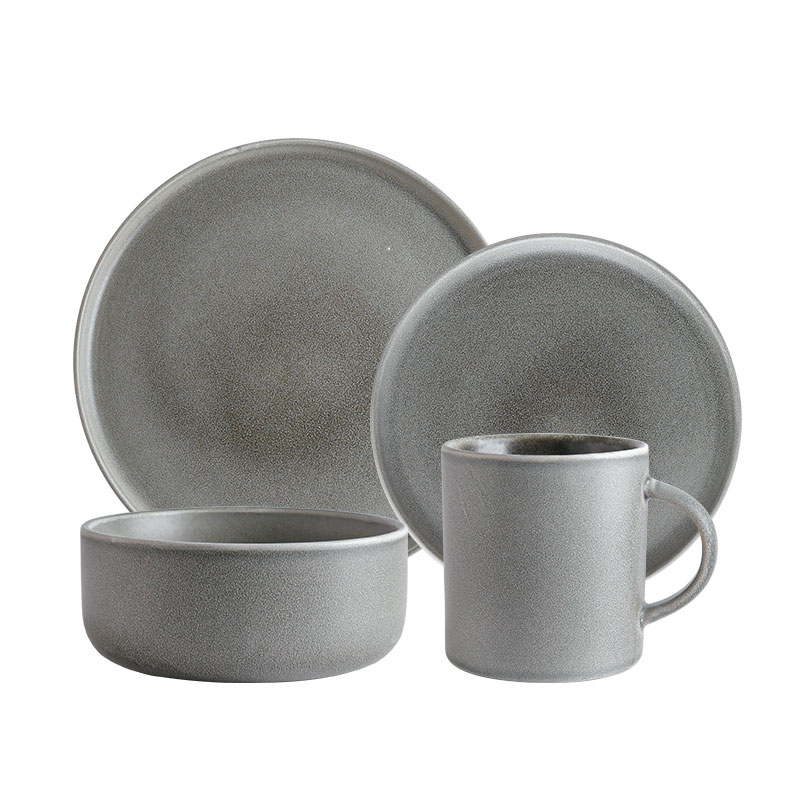 Set of four stoneware dinnerware